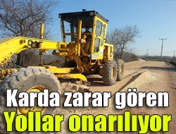 Karda zarar gören yollar onarılıyor