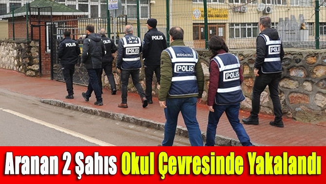 Aranan 2 şahıs okul çevresinde yakalandı