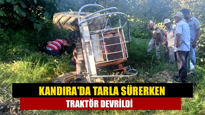 Kandırada Tarla sürerken traktör devrildi