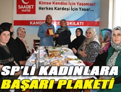 SPli kadınlara başarı plaketi