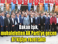 Bakan Işık, muhalefetten AK Partiye geçen 87 kişiye rozet taktı