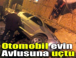 Otomobil evin avlusuna uçtu