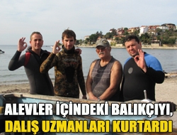 Alevler içindeki balıkçıyı, dalış uzmanları kurtardı