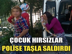 Çocuk hırsızlar polise taşla saldırdı