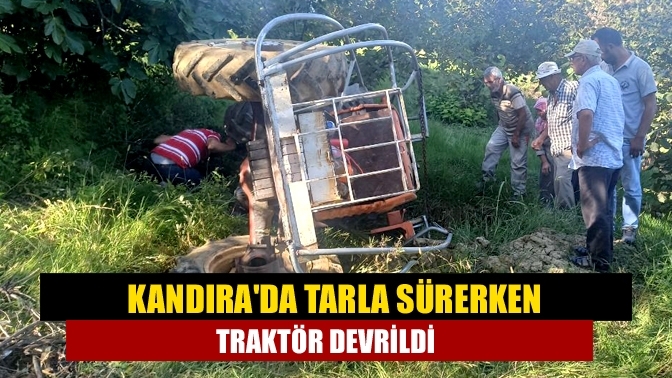 Kandıra'da Tarla sürerken traktör devrildi
