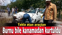 Takla atan araçtan burnu bile kanamadan kurtuldu