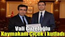 Vali Güzeloğlu Kaymakam Çiçek i kutladı